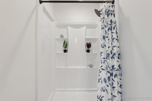 full bathroom with a shower with shower curtain