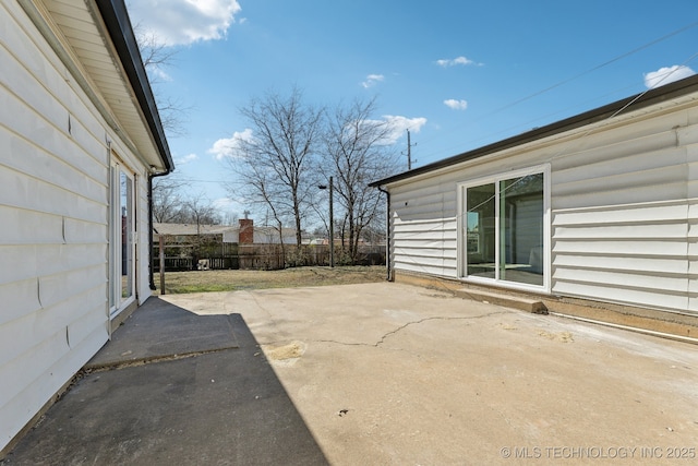 view of patio with fence