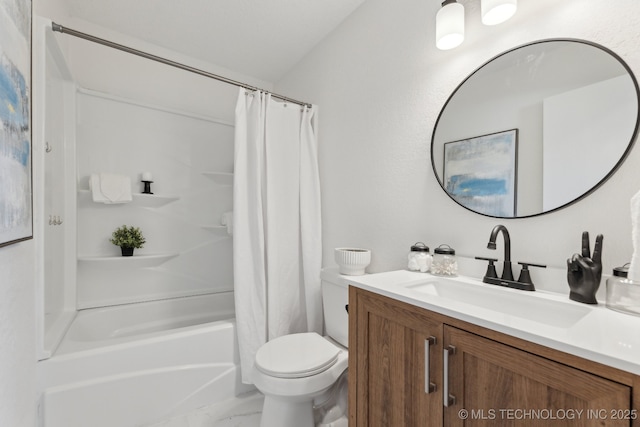 full bathroom featuring marble finish floor, shower / bath combo, vanity, and toilet