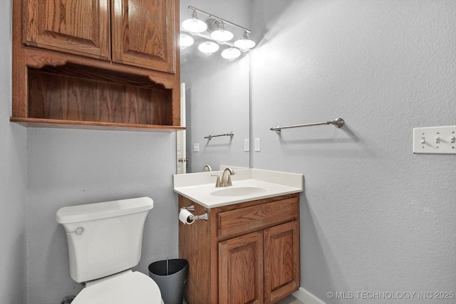 half bath with toilet and vanity