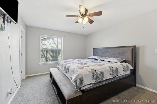 bedroom with carpet floors, ceiling fan, and baseboards