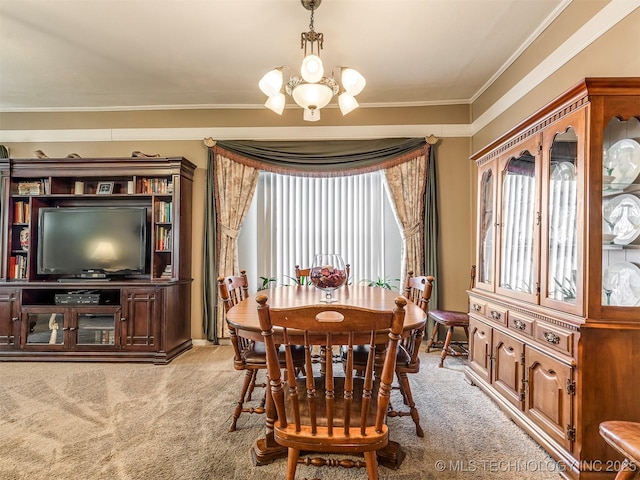 dining space featuring light carpet, a chandelier, and a wealth of natural light