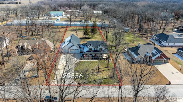 birds eye view of property with a residential view