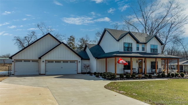 modern inspired farmhouse featuring a garage, driveway, a shingled roof, a porch, and a front lawn