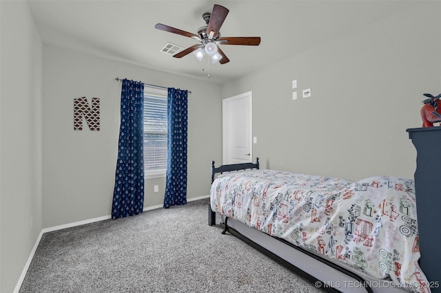 bedroom with carpet floors, visible vents, baseboards, and a ceiling fan