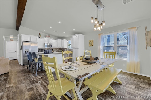 dining area featuring vaulted ceiling with beams, dark wood-type flooring, visible vents, and baseboards