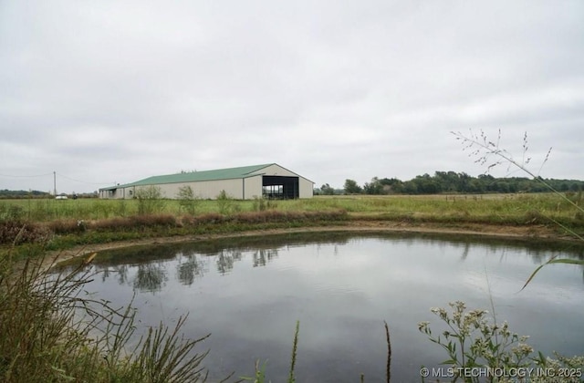 view of water feature featuring an outbuilding