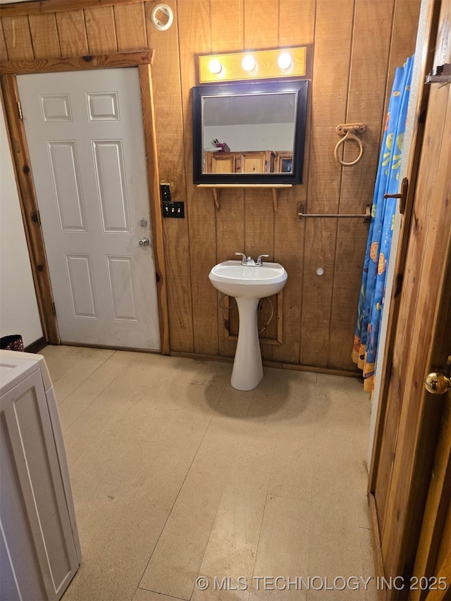 16100 Ash Rd, Morris, OK 74445 - bathroom featuring wooden walls and tile patterned floors