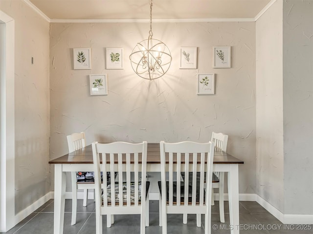 dining space with baseboards, an inviting chandelier, tile patterned floors, and crown molding