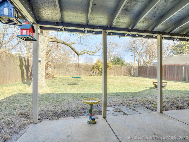 view of yard with a patio area and a fenced backyard