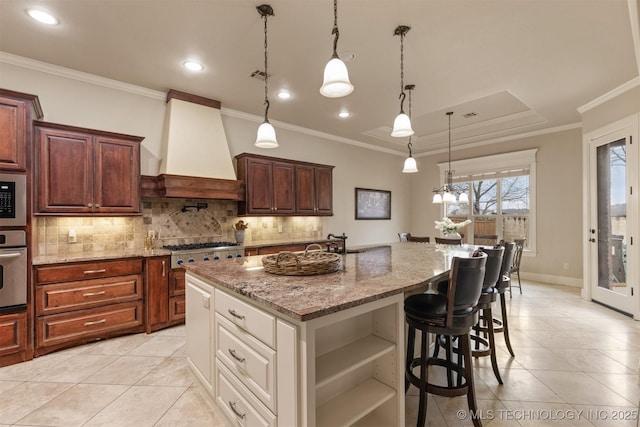 11870 S Oswego Ave, Tulsa, OK 74137 - kitchen featuring custom exhaust hood, light tile patterned flooring, backsplash, light stone countertops, and ornamental molding