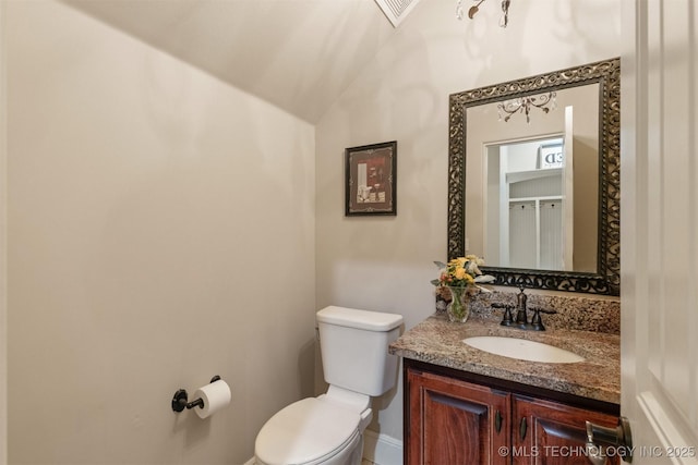 11870 S Oswego Ave, Tulsa, OK 74137 - half bath featuring toilet, vanity, baseboards, and lofted ceiling