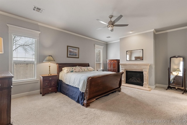 11870 S Oswego Ave, Tulsa, OK 74137 - carpeted bedroom featuring baseboards, ornamental molding, a glass covered fireplace, and a ceiling fan