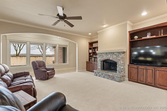 11870 S Oswego Ave, Tulsa, OK 74137 - living area with carpet flooring, ceiling fan, crown molding, a fireplace, and recessed lighting