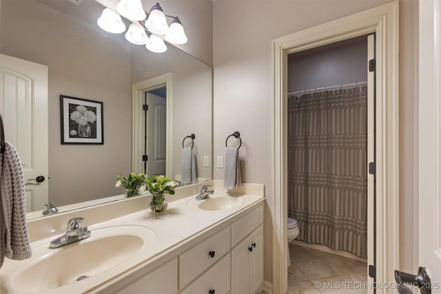 11870 S Oswego Ave, Tulsa, OK 74137 - full bath with toilet, tile patterned flooring, double vanity, and a chandelier