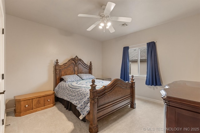 11870 S Oswego Ave, Tulsa, OK 74137 - bedroom with light colored carpet, baseboards, and a ceiling fan