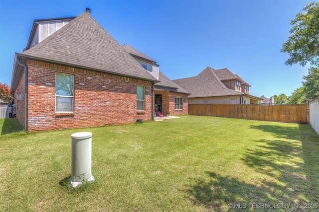 11870 S Oswego Ave, Tulsa, OK 74137 - back of house with brick siding and a shingled roof