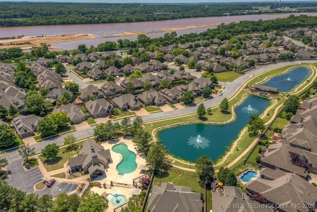 11870 S Oswego Ave, Tulsa, OK 74137 - aerial view of property and surrounding area with a large body of water, a pool, and nearby suburban area