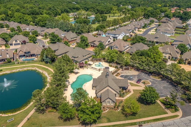 11870 S Oswego Ave, Tulsa, OK 74137 - aerial view of property's location with a pool, nearby suburban area, and a nearby body of water