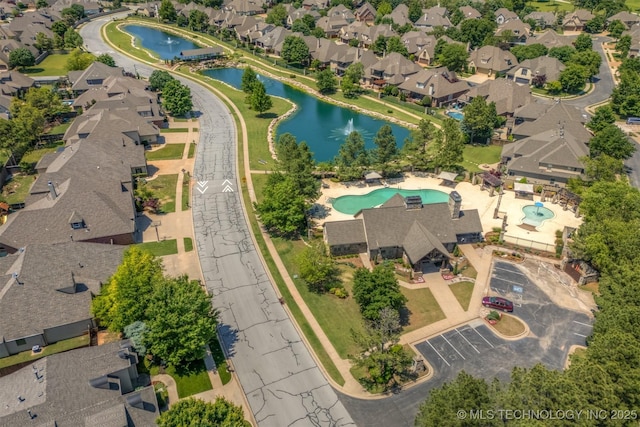 11870 S Oswego Ave, Tulsa, OK 74137 - aerial view of property and surrounding area with a pool area, a nearby body of water, and nearby suburban area