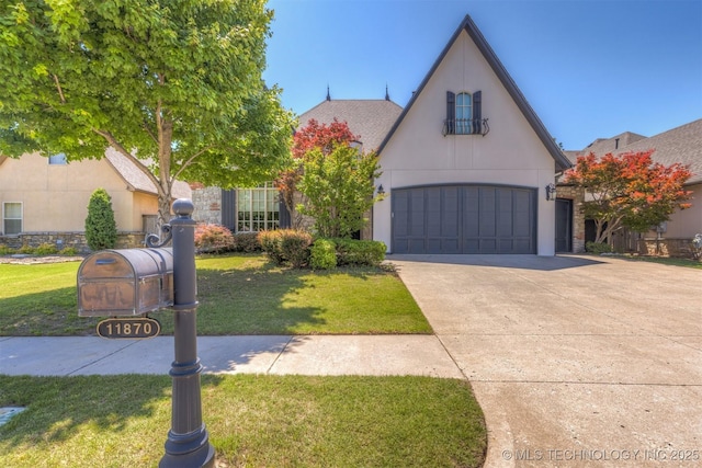 11870 S Oswego Ave, Tulsa, OK 74137 - view of front of home featuring stucco siding, a front yard, concrete driveway, and a garage