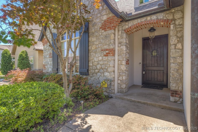 11870 S Oswego Ave, Tulsa, OK 74137 - property entrance with stone siding
