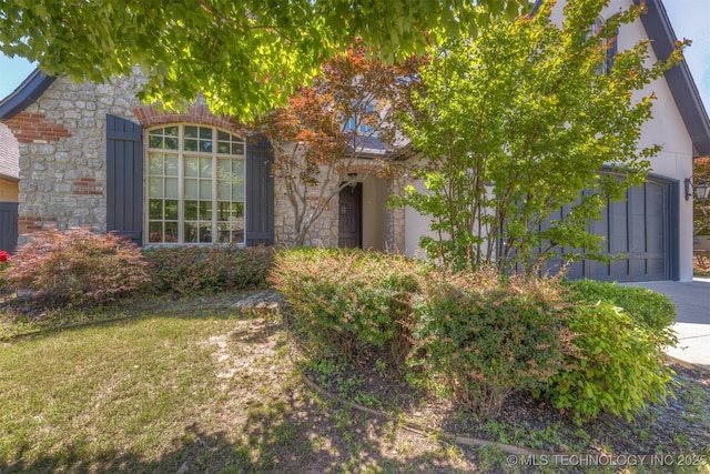 11870 S Oswego Ave, Tulsa, OK 74137 - view of front facade featuring stone siding