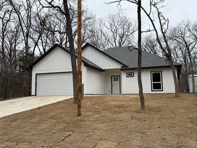 modern inspired farmhouse featuring concrete driveway, roof with shingles, and an attached garage