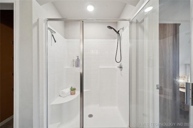 bathroom with a stall shower