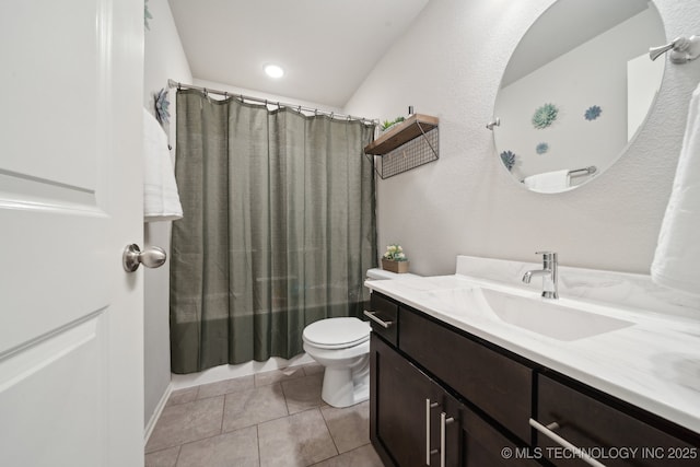 full bathroom featuring toilet, tile patterned flooring, and vanity