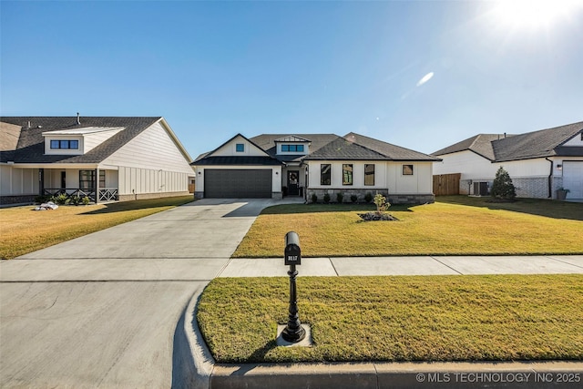 modern farmhouse style home with driveway, a garage, fence, and a front yard