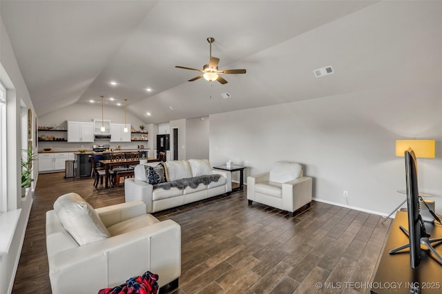 living area featuring dark wood-style floors, lofted ceiling, visible vents, ceiling fan, and baseboards