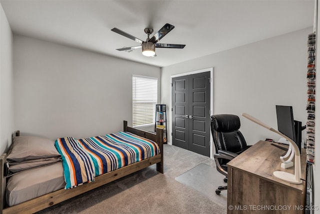 carpeted bedroom featuring ceiling fan