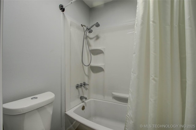 bathroom with toilet and shower / bathtub combination with curtain