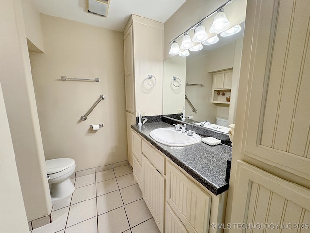 half bath featuring visible vents, baseboards, toilet, tile patterned flooring, and vanity