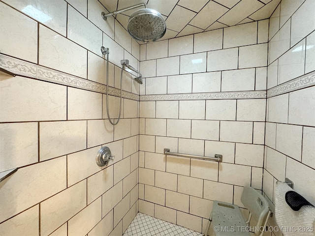 full bath with tiled shower