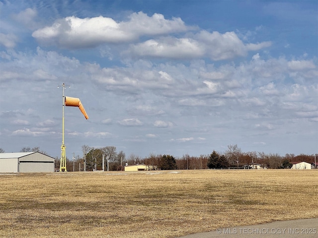 surrounding community featuring an outdoor structure