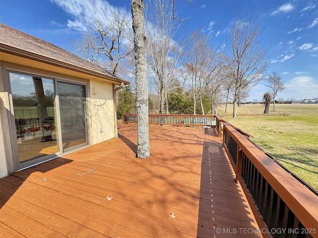 deck featuring a lawn