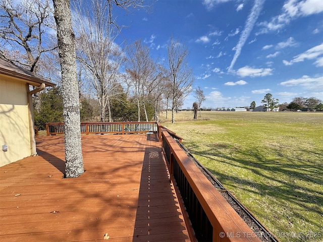 deck featuring a lawn