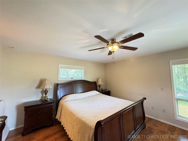32432 S Skyline Dr, Cookson, OK 74427 - bedroom with dark wood-type flooring and ceiling fan