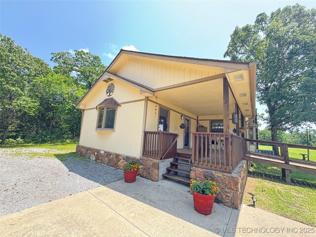 32432 S Skyline Dr, Cookson, OK 74427 - view of front of home with a porch