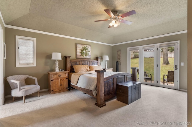 bedroom with lofted ceiling, access to outside, crown molding, and light colored carpet