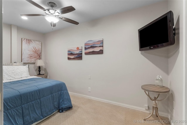 bedroom featuring carpet flooring, a ceiling fan, and baseboards