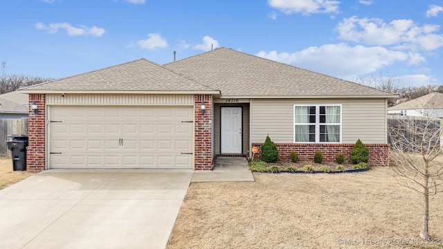 ranch-style house with an attached garage, brick siding, fence, driveway, and roof with shingles