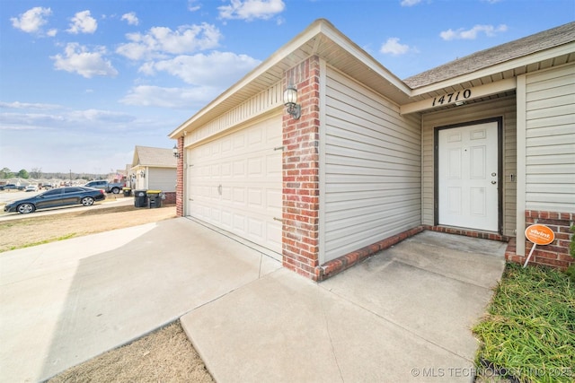 garage with driveway