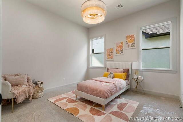 12030 S Vandalia Ave, Tulsa, OK 74137 - bedroom with carpet and baseboards