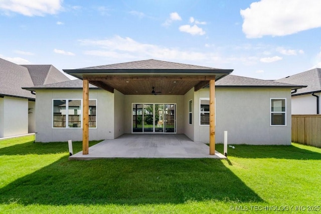 12030 S Vandalia Ave, Tulsa, OK 74137 - rear view of house featuring ceiling fan, stucco siding, and a patio