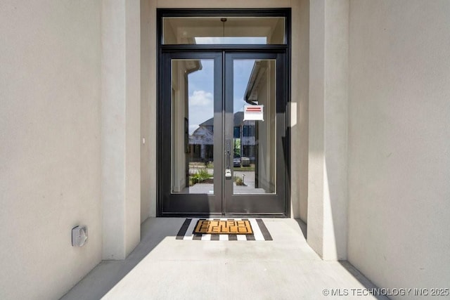 12030 S Vandalia Ave, Tulsa, OK 74137 - property entrance with french doors and stucco siding