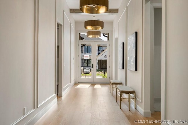 12030 S Vandalia Ave, Tulsa, OK 74137 - corridor with french doors and light wood finished floors