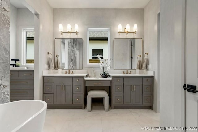 12030 S Vandalia Ave, Tulsa, OK 74137 - full bath with a soaking tub and double vanity
